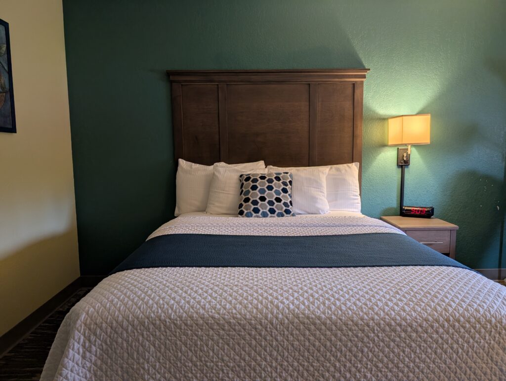 Queen bed at the IM Hotel